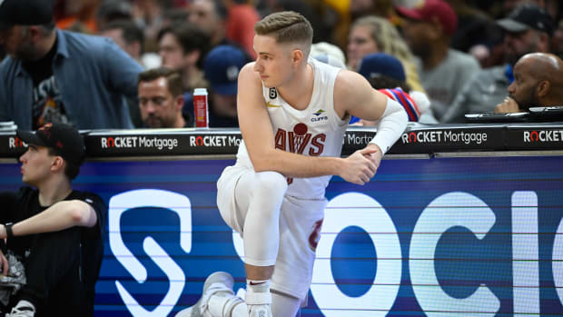 Mar 4, 2023; Cleveland, Ohio, USA; Cleveland Cavaliers guard Sam Merrill (5) kneels on the south in the fourth quarter against the Detroit Pistons at Rocket Mortgage FieldHouse. Mandatory Credit: David Richard-USA TODAY Sports